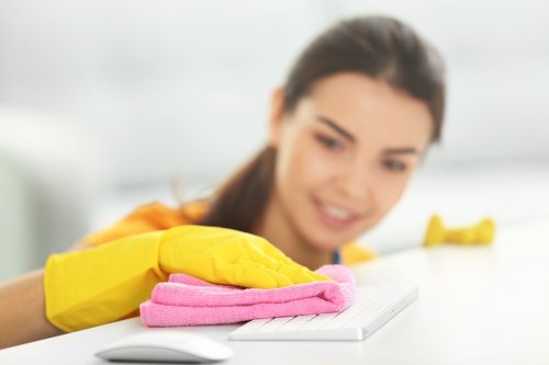 Cleaning specialist in Merton treating a carpet for deep cleaning