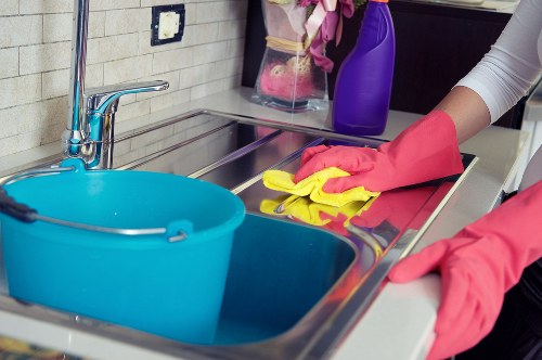 Cleaner preparing a rented property for checkout